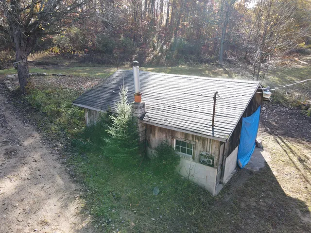 $650,000 | 401 South Bass Lake Avenue, Harrison, MI 48625