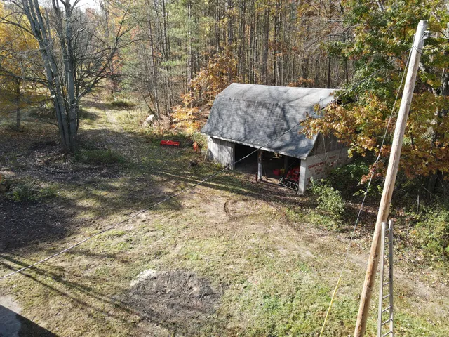 $650,000 | 401 South Bass Lake Avenue, Harrison, MI 48625