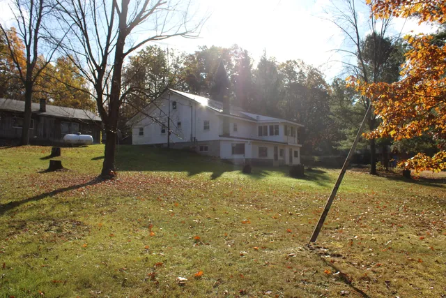 $650,000 | 401 South Bass Lake Avenue, Harrison, MI 48625