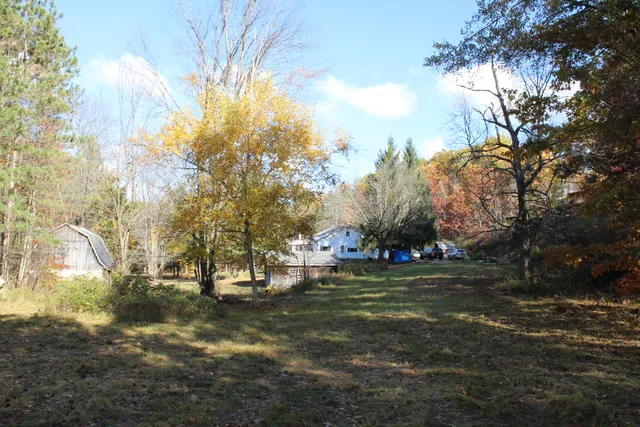 $650,000 | 401 South Bass Lake Avenue, Harrison, MI 48625