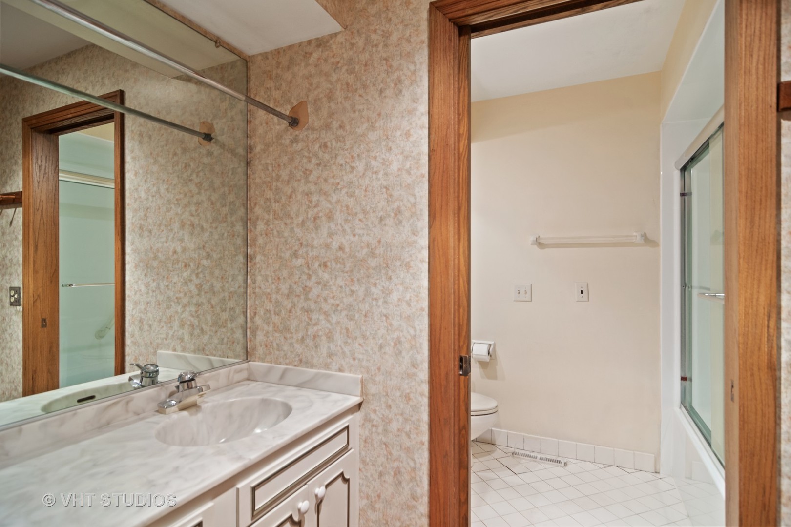 2327 Coach Road Long Grove, IL 60047 - Photo 22 of 58 a bathroom with a sink and a mirror