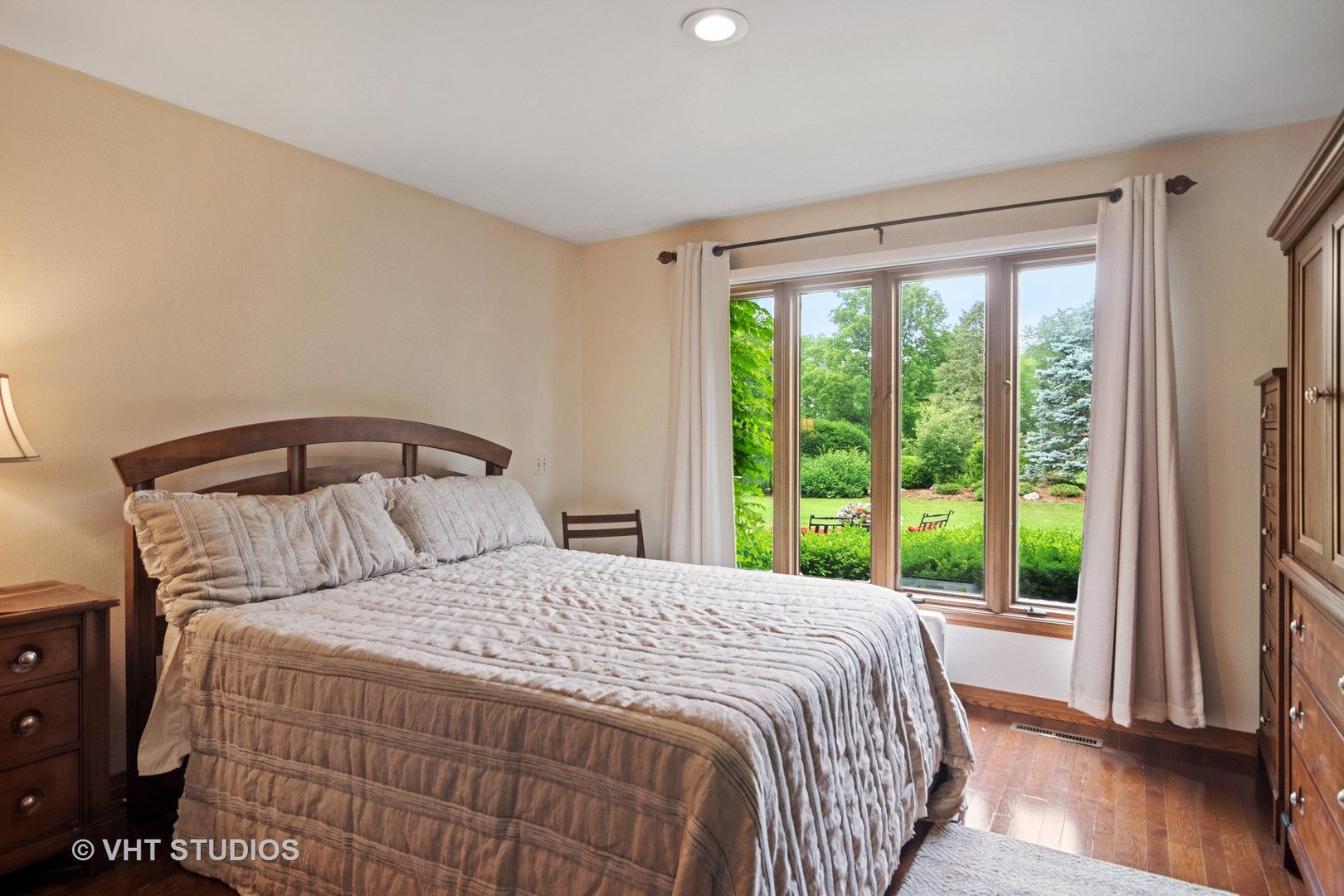2327 Coach Road Long Grove, IL 60047 - Photo 24 of 58 a bedroom with a large bed and a large window