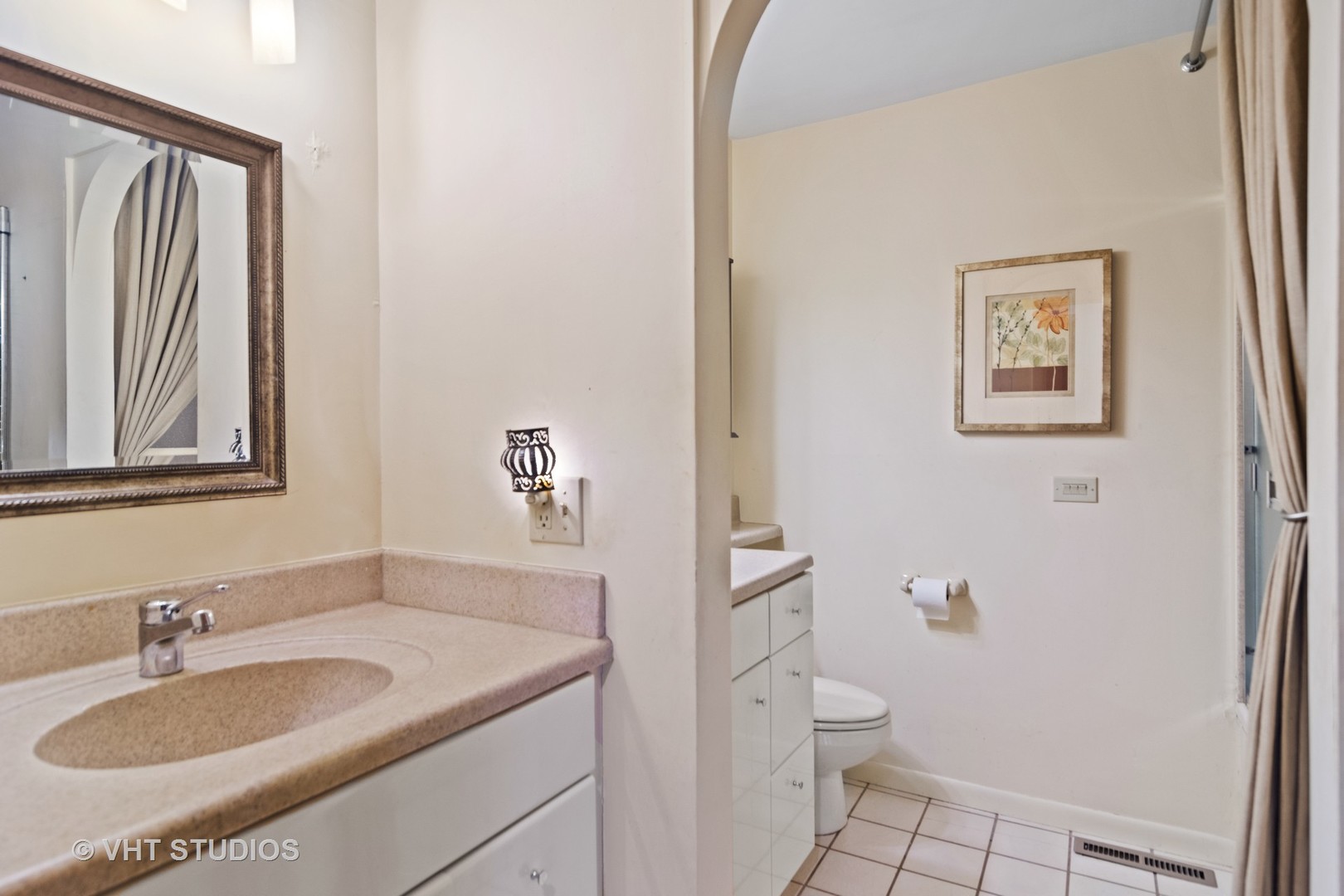 2327 Coach Road Long Grove, IL 60047 - Photo 26 of 58 a bathroom with a granite countertop sink toilet and a mirror