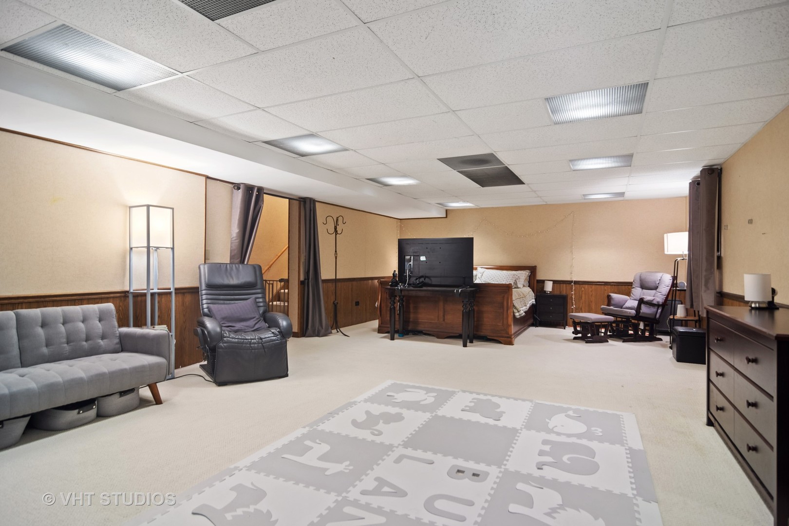 2327 Coach Road Long Grove, IL 60047 - Photo 29 of 58 a living room with furniture and a flat screen tv
