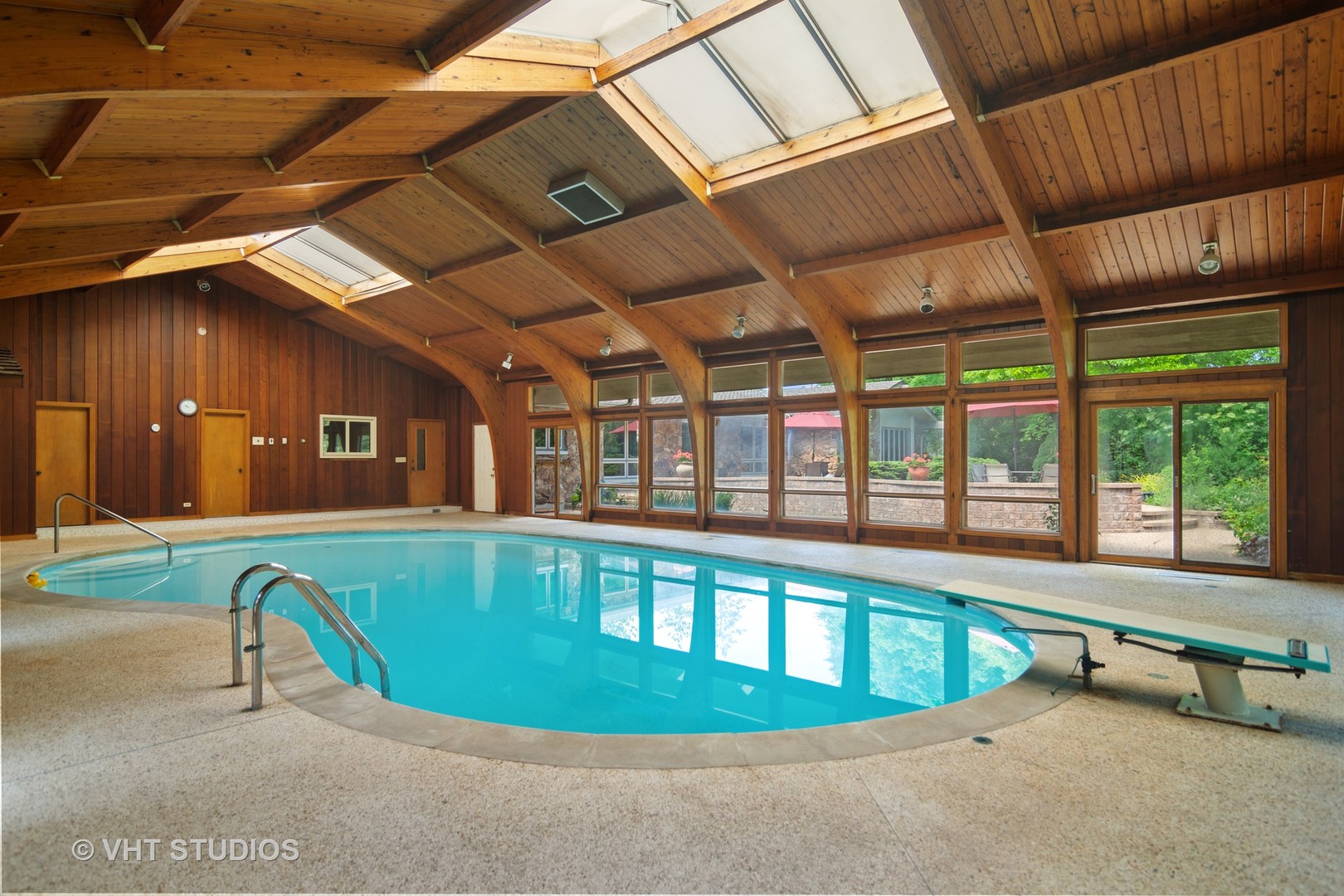 2327 Coach Road Long Grove, IL 60047 - Photo 37 of 58 a view of a swimming pool with a lounge chairs