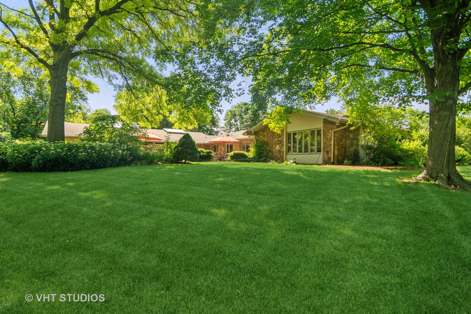 2327 Coach Road Long Grove, IL 60047 - Photo 41 of 58 a front view of a house with garden
