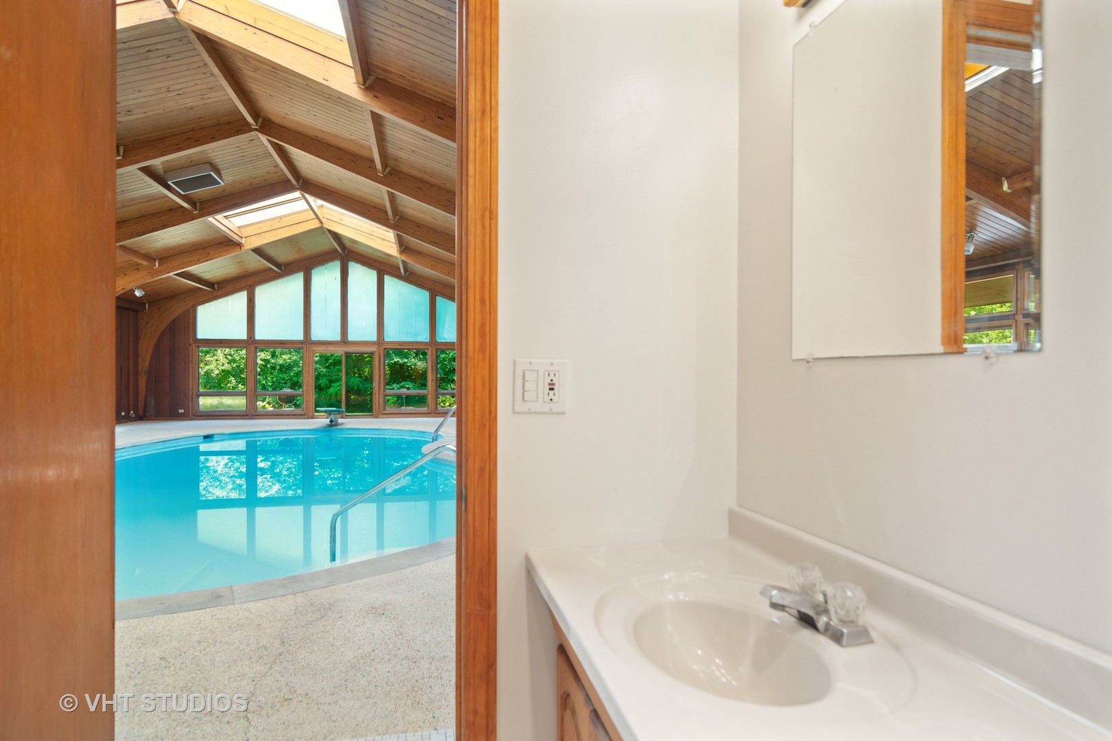 2327 Coach Road Long Grove, IL 60047 - Photo 48 of 58 a bathroom with a sink and a mirror