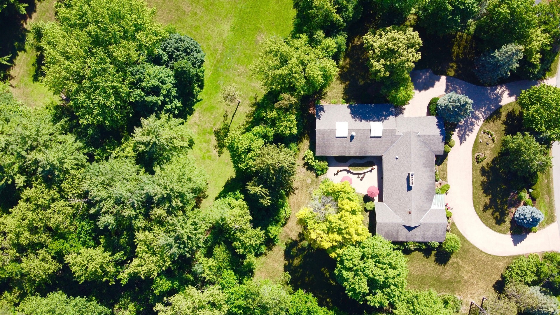 2327 Coach Road Long Grove, IL 60047 - Photo 55 of 58 an aerial view of a house with a yard and garden