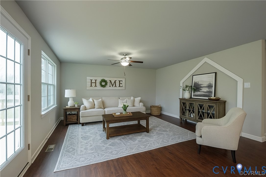 4820 Bethlehem Road Richmond, VA 23230 - Photo 3 of 13 Spacious living area featuring wood-finish floorin