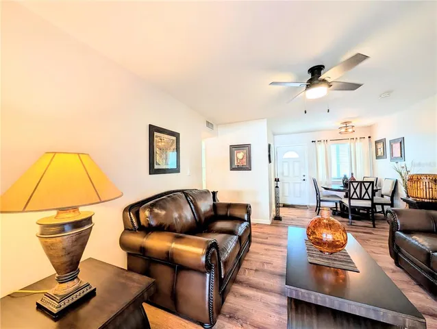 a bathroom with a bath tub with a shower