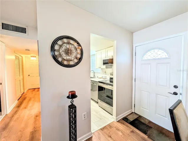a view of a hallway with elevator