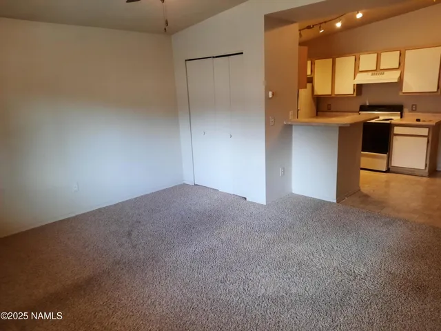 a view of kitchen and a window