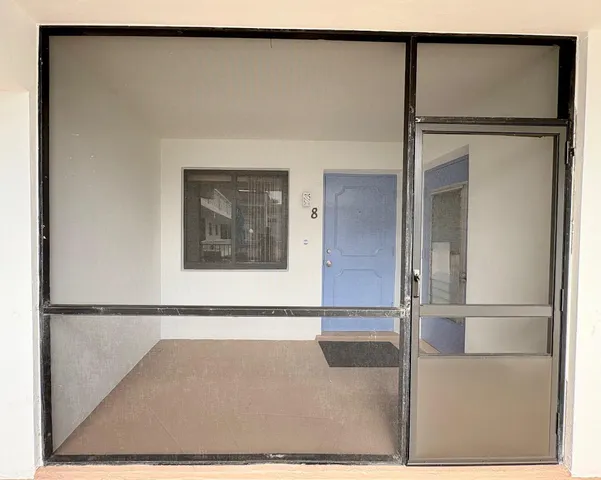 a picture of a room with wooden floor