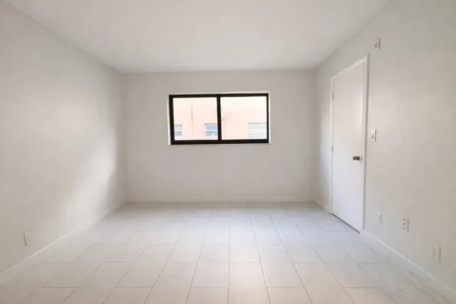 an empty room with a window