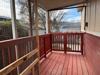 355 Colver Road, Unit 24 Talent, OR 97540 - Photo 3 of 21 a view of wooden balcony with a swing