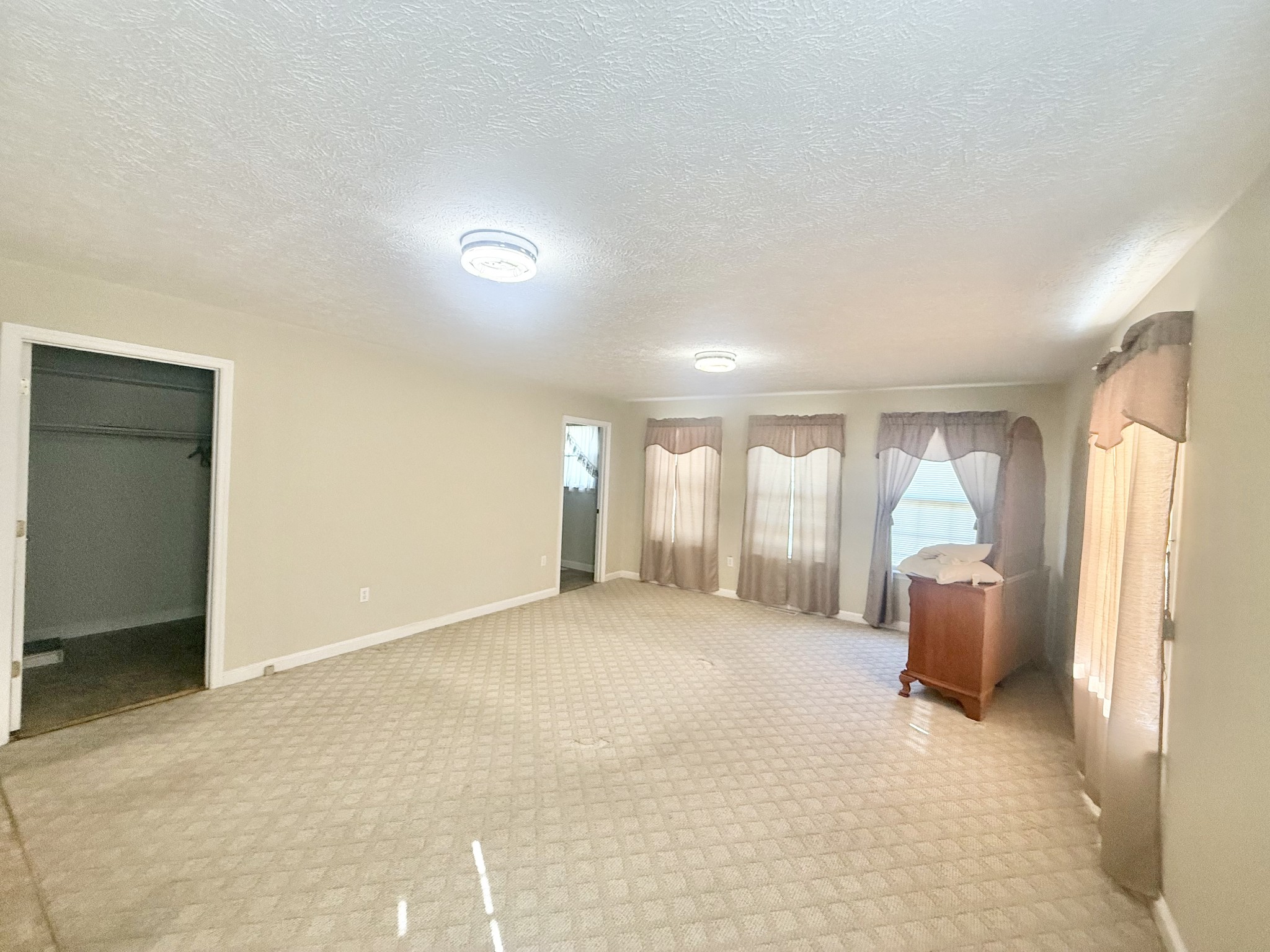 3065 Bucksnort Ridge Road Collinwood, TN 38450 - Photo 5 of 12 an empty room with furniture and wooden floor