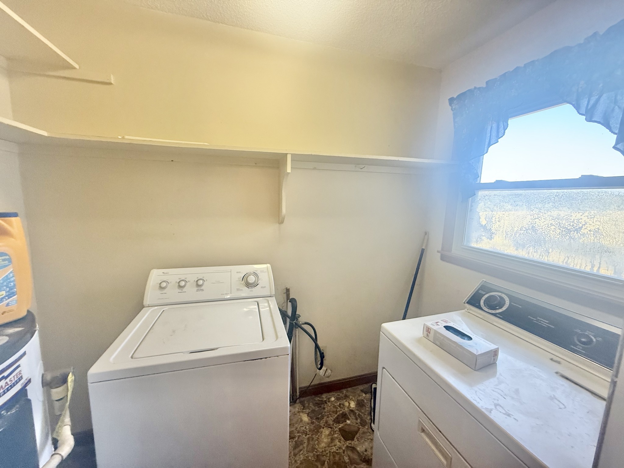 3065 Bucksnort Ridge Road Collinwood, TN 38450 - Photo 10 of 12 a utility room with dryer and washer
