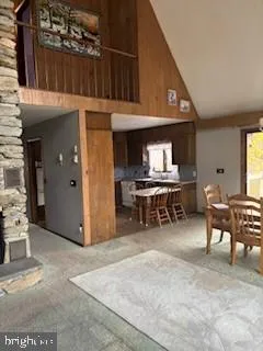 a view of dining room with chairs