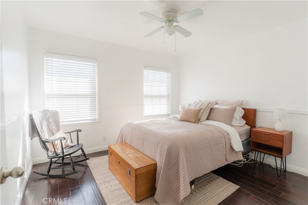 4743 Coldbrook Avenue Lakewood, CA 90713 - Photo 18 of 39 a bedroom with a bed a chair and a window