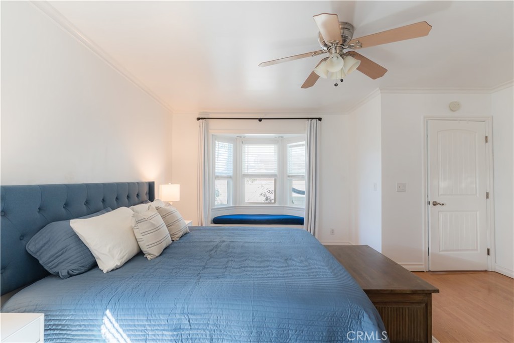 4743 Coldbrook Avenue Lakewood, CA 90713 - Photo 26 of 39 a bedroom with a large bed and a window