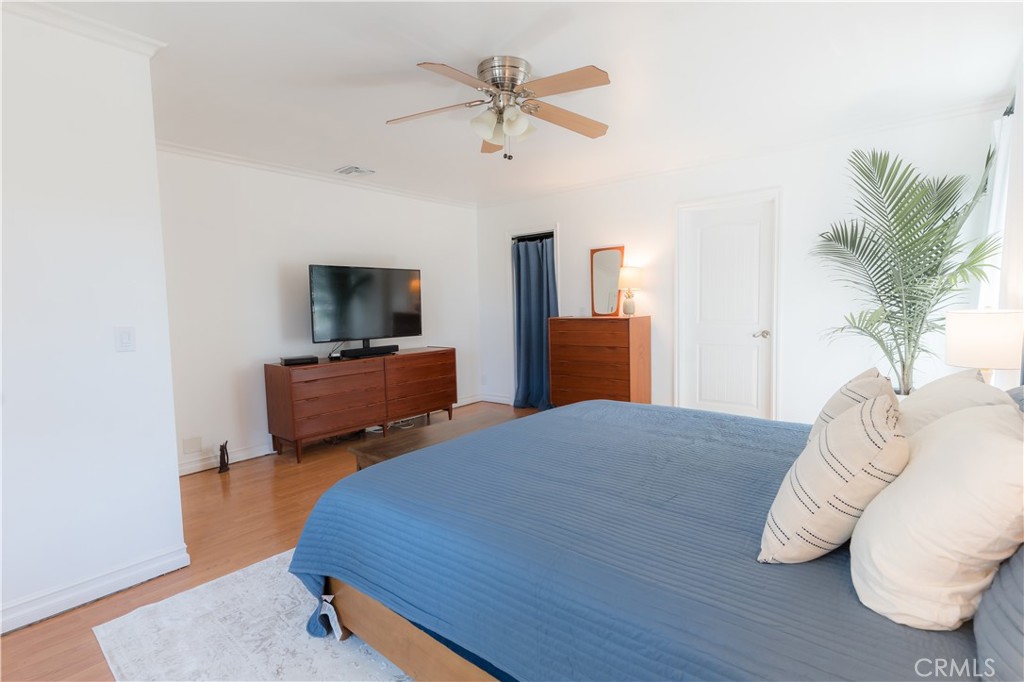 4743 Coldbrook Avenue Lakewood, CA 90713 - Photo 28 of 39 a bedroom with furniture and a flat screen tv