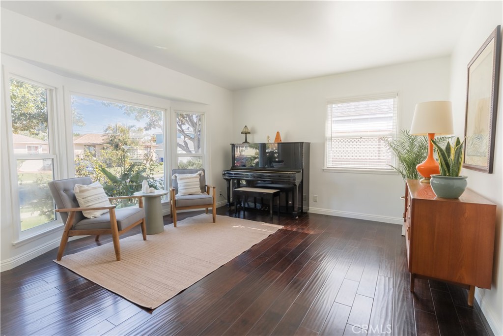 4743 Coldbrook Avenue Lakewood, CA 90713 - Photo 3 of 39 a living room with furniture and a wooden floor