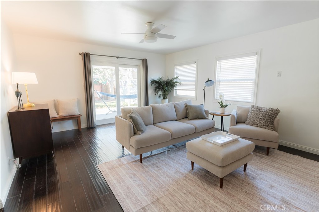 4743 Coldbrook Avenue Lakewood, CA 90713 - Photo 36 of 39 a living room with furniture wooden floor and a window