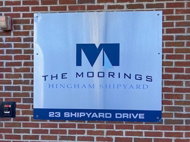 23 Shipyard Drive, Unit 303 Hingham, MA 02043 - Photo 2 of 13 a sign on the wall
