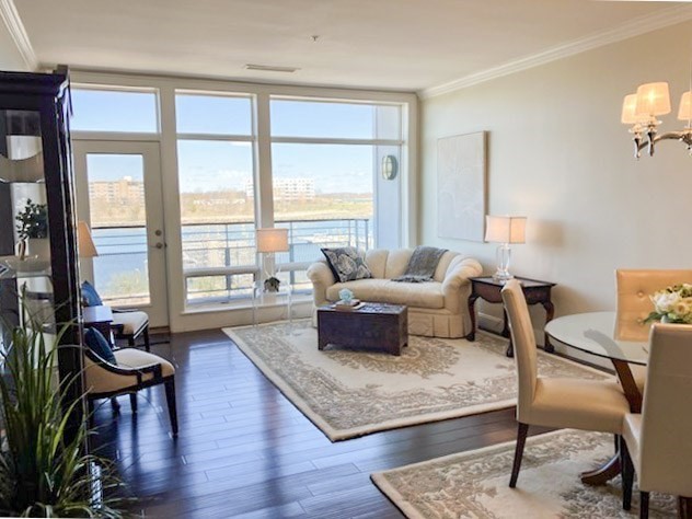 23 Shipyard Drive, Unit 303 Hingham, MA 02043 - Photo 7 of 13 a living room with furniture and a large window