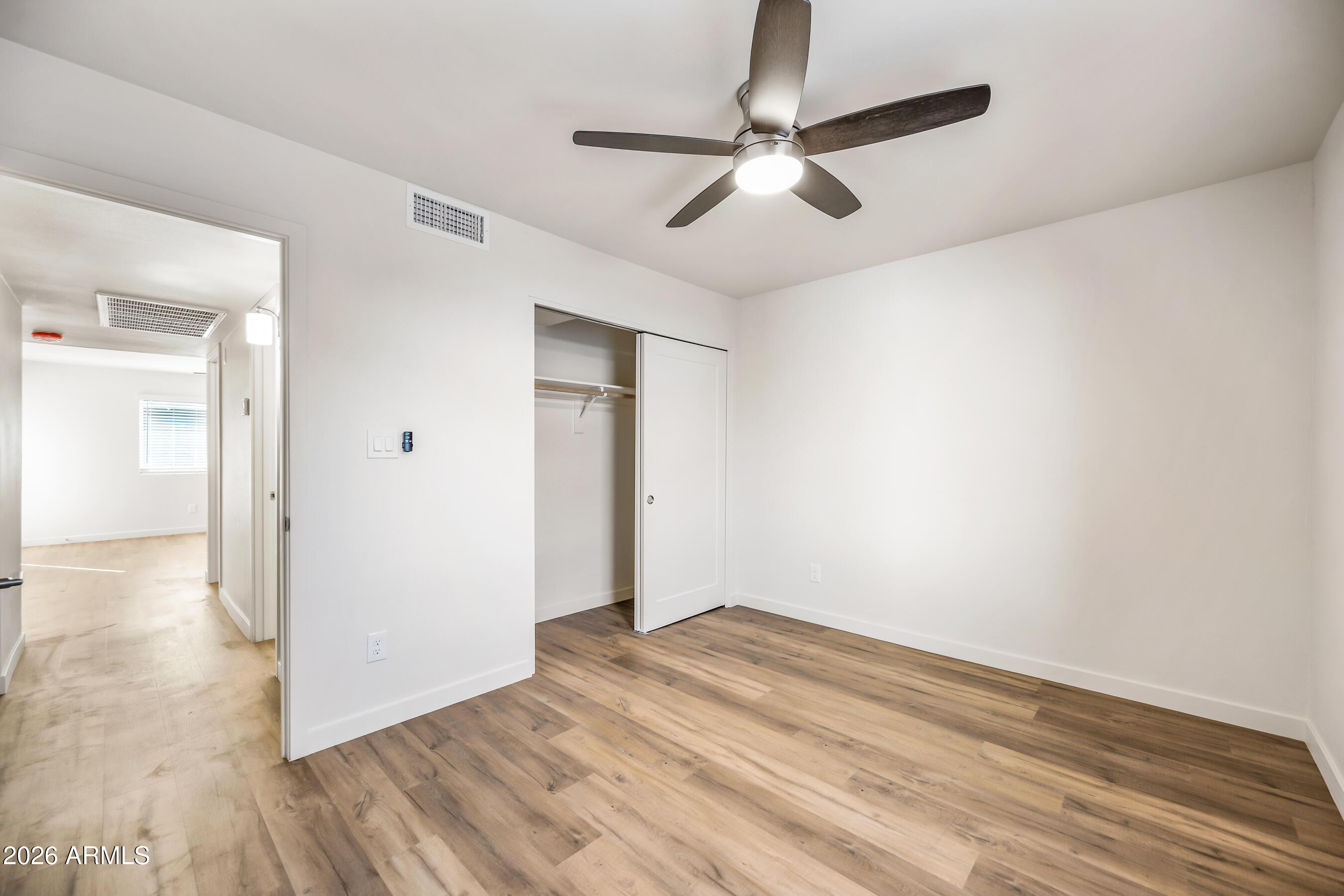 4139 North 27th Street, Unit 3 Phoenix, AZ 85016 - Photo 18 of 30 wooden floor in an empty room