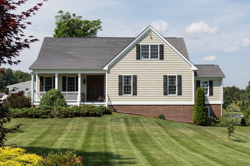 126 Niswander Road Staunton, VA 24401 - Photo 3 of 50 a front view of a house with garden