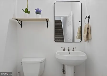 a bed room with a bed and furniture