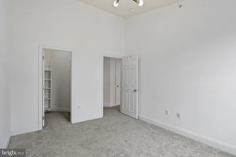 a view of a hallway with entryway