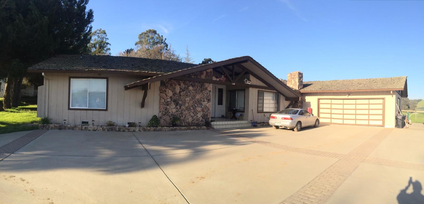 a view of a house with a patio