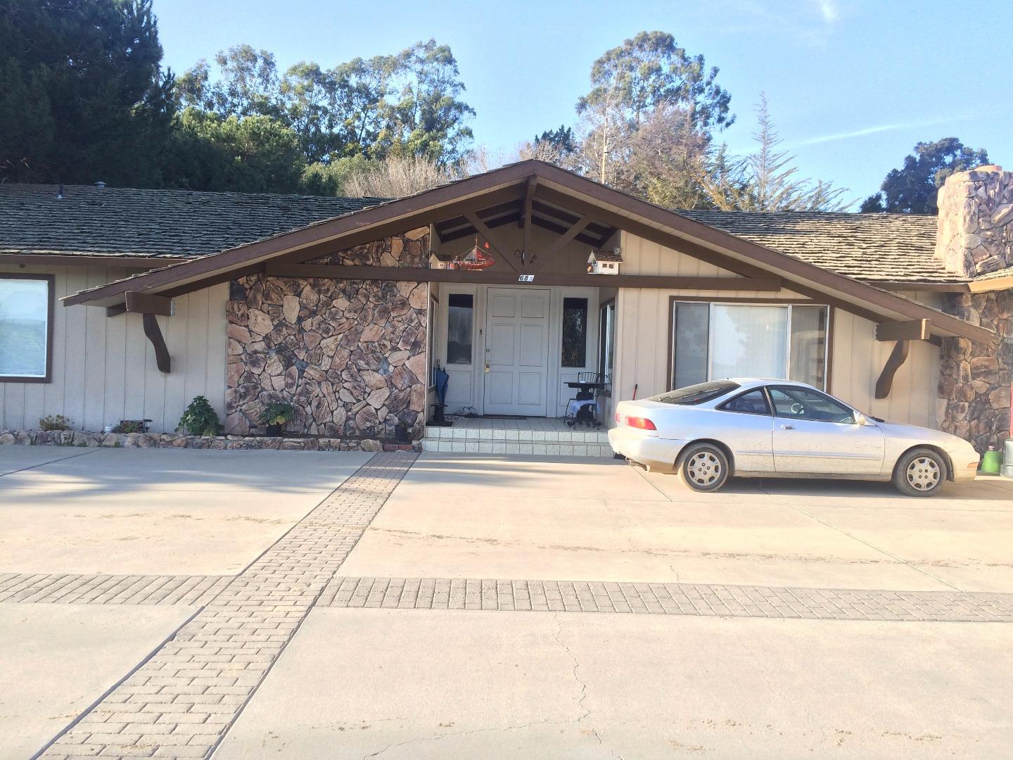 684 Harrison Road Salinas, CA 93907 - Photo 8 of 11 a view of a car parked in front of a house