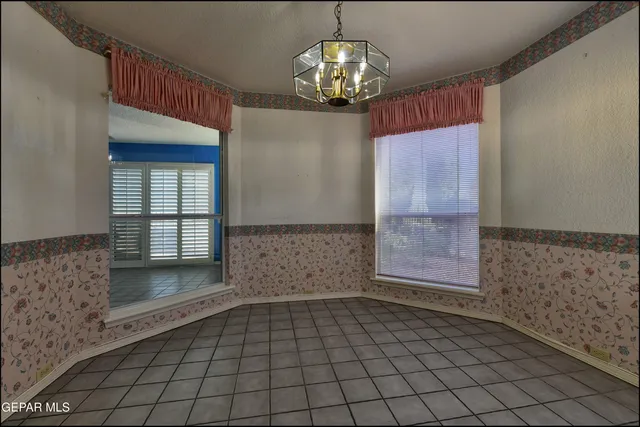 a bathroom with a sink and glass door