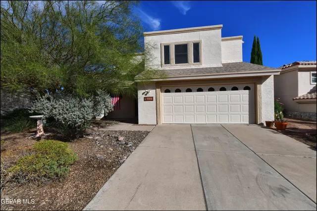 a view of a door and wooden floor