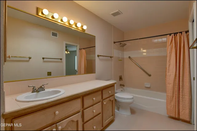 an aerial view of a house with a swimming pool