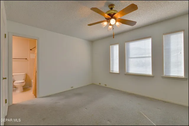 an aerial view of a house with outdoor space