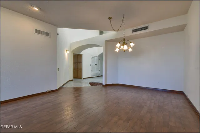 a kitchen with stainless steel appliances granite countertop a sink counter space and cabinets