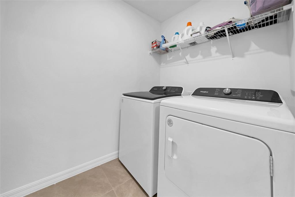 13295 Mylion Way Spring Hill, FL 34610 - Photo 40 of 68 a utility room with dryer and washer