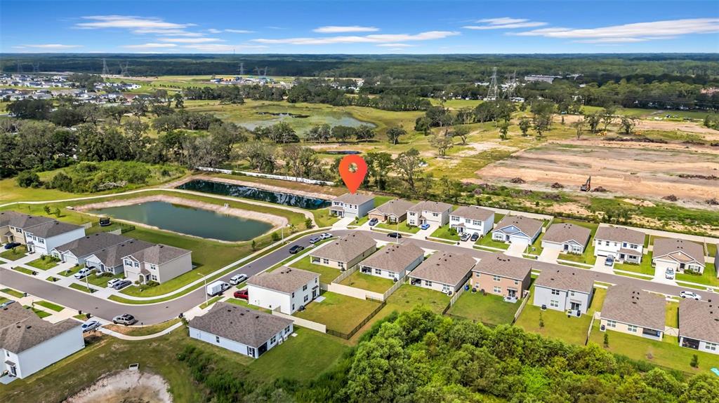 13295 Mylion Way Spring Hill, FL 34610 - Photo 60 of 68 an aerial view of residential houses with outdoor space