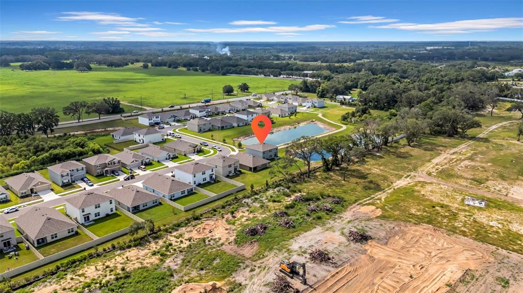 13295 Mylion Way Spring Hill, FL 34610 - Photo 62 of 68 a view of a city with lots of residential buildings ocean and mountain view in back