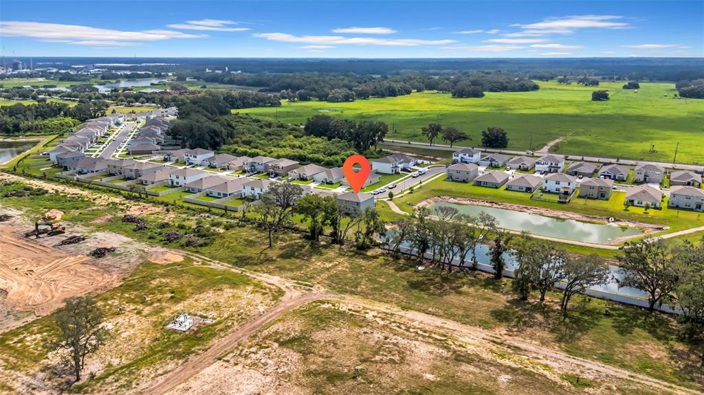 13295 Mylion Way Spring Hill, FL 34610 - Photo 64 of 68 a view of a city with an ocean beach