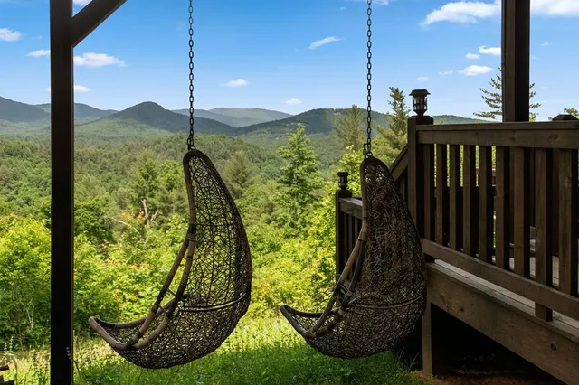 a view of a chairs and table in the patio