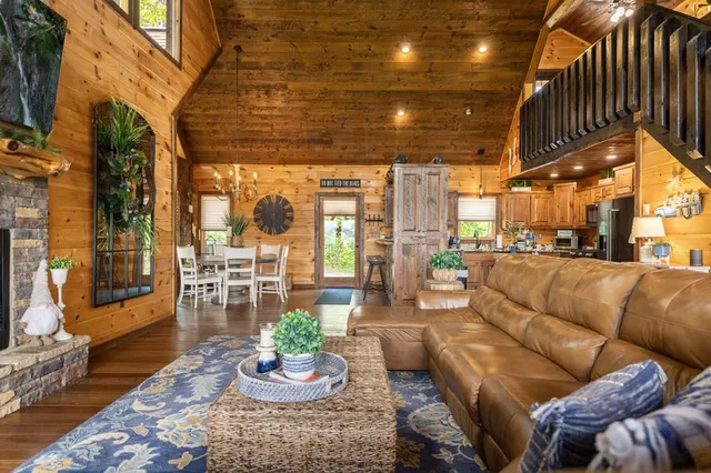 a kitchen with refrigerator and cabinets