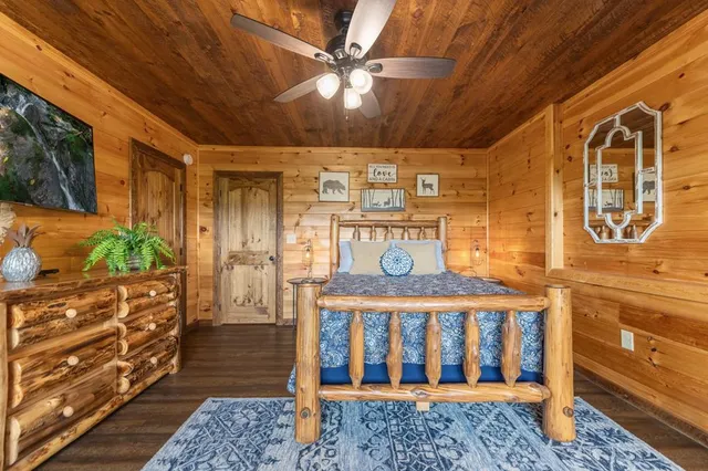 a room with lots of furniture and a chandelier