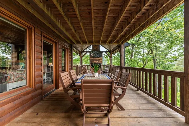 a spacious bedroom with a bed and a large window