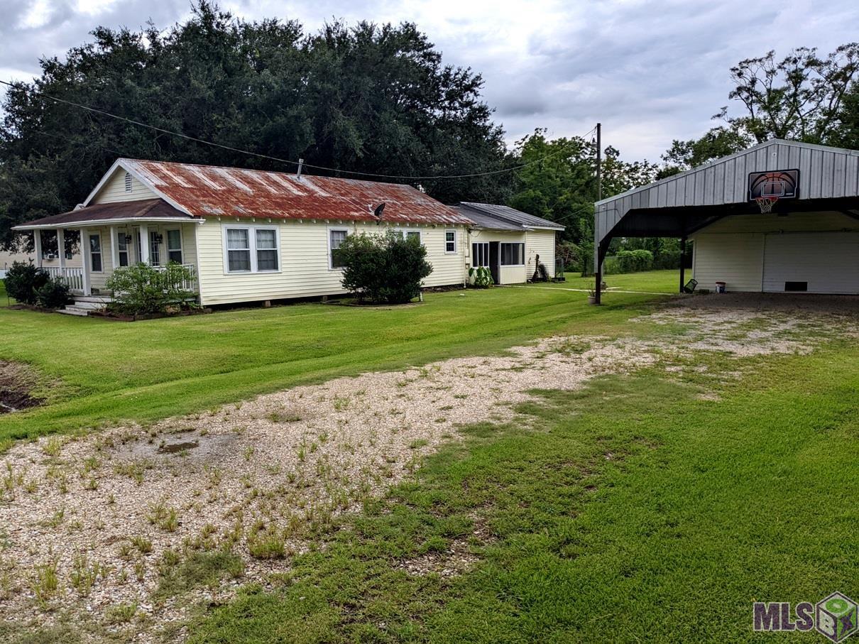 10347 Taylor Sheets Jr Road St. Amant, LA 70774 - Photo 3 of 25 Home Bonus Living Area and Detached Carport/Workshop