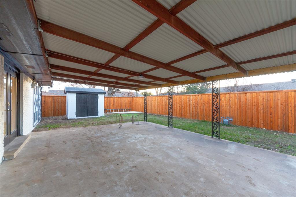 1241 Stevens Ridge Drive Dallas, TX 75211 - Photo 20 of 22 Cover Patio with shed